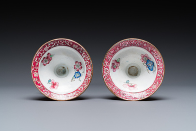 A pair of Chinese Canton enamel 'lotus' candlesticks, Yongzheng