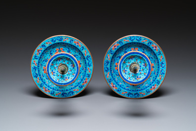 A pair of Chinese light-blue-ground Canton enamel candlesticks, Yongzheng