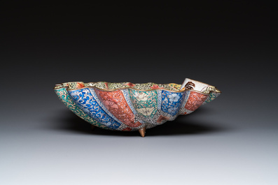 A Chinese Canton enamel helm-shaped ewer with shell-shaped basin, Yongzheng/Qianlong