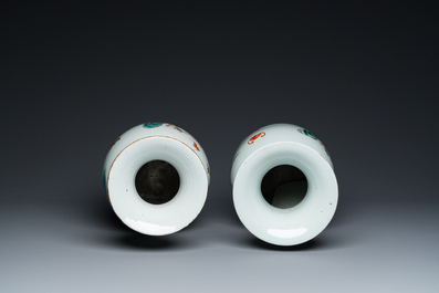 A pair of Chinese famille rose 'Sanxing' vases, 19th C.