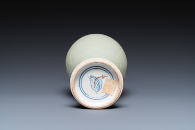 A Chinese celadon-glazed vase with underglaze floral design, Kangxi