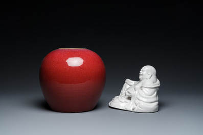 A Chinese sang-de-boeuf-glazed jar, a blanc de Chine Buddha and two plates, 19th C.