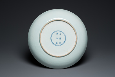 A large Chinese famille verte 'horseriders' dish, Kangxi mark, 19th C.