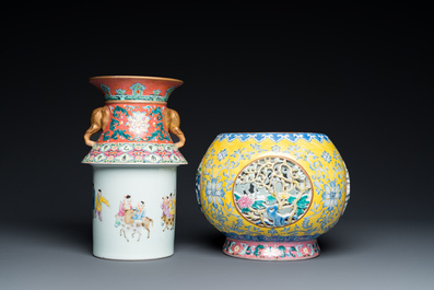 A Chinese reticulated and revolving famille rose vase consisting of two parts, Qianlong mark, 20th C.
