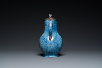 A monochrome blue Brussels faience jug with pewter cover, 18th C.