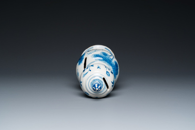 A Dutch Delft blue and white double gourd money bank with a deer hunt, dated 1732