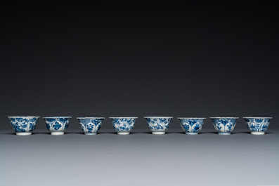 Twelve Chinese blue and white saucers and eight cups, Kangxi