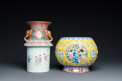 A Chinese reticulated and revolving famille rose vase consisting of two parts, Qianlong mark, 20th C.
