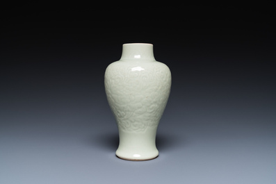 A Chinese celadon-glazed vase with underglaze floral design, Kangxi