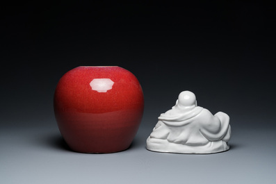 A Chinese sang-de-boeuf-glazed jar, a blanc de Chine Buddha and two plates, 19th C.