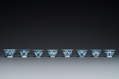 Twelve Chinese blue and white saucers and eight cups, Kangxi
