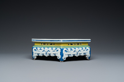 A rare Chinese famille rose hexagonal 'antiquities' stand, Yongzheng