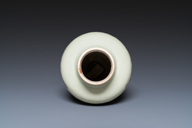 A Chinese celadon-glazed vase with underglaze floral design, Kangxi