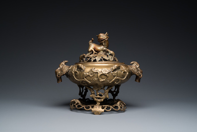 A large Chinese bronze reticulated censer and cover on stand, 19th C.