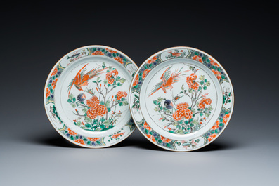 A pair of Chinese famille verte plates with a bird above a peony bush, Kangxi