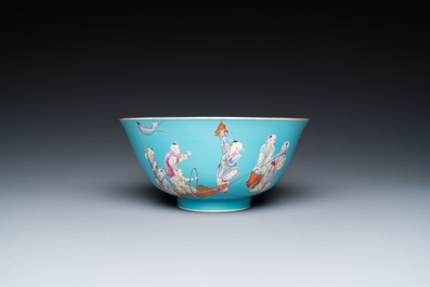 A Chinese famille rose bowl with playing boys on a turquoise ground, Qianlong mark, 20th C.