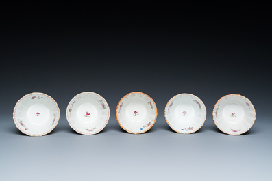 Five Chinese famille rose cups and saucers with a heron eating a fish, Qianlong