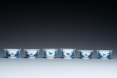 Six Chinese blue and white 'Lady and dog' cups and saucers, Kangxi