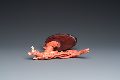 A Chinese red coral sculpture of the immortal Lan Caihe, 19/20th C.