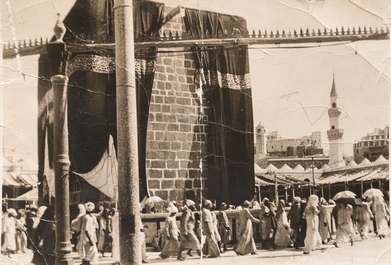 A black and white photo of the Kaaba at Mecca, dated 1914