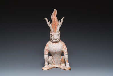 A Chinese painted pottery earth spirit, Tang