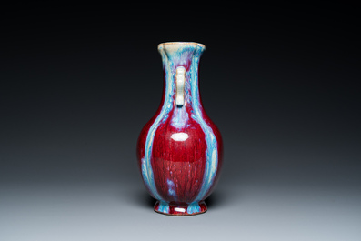 A Chinese flamb&eacute;-glazed 'hu' vase, Qianlong mark, 19/20th C.