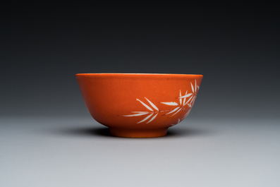 A Chinese coral-ground reserve-decorated 'bamboo' bowl, Xuantong mark, 20th C.