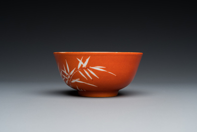 A Chinese coral-ground reserve-decorated 'bamboo' bowl, Xuantong mark, 20th C.