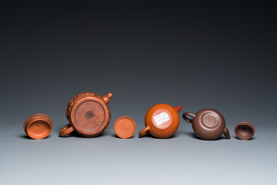 Three Chinese Yixing stoneware teapots with covers and a pair of famille rose pheasants, 19/20th C.