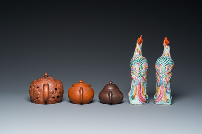 Three Chinese Yixing stoneware teapots with covers and a pair of famille rose pheasants, 19/20th C.
