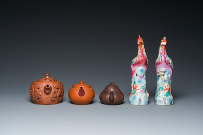 Three Chinese Yixing stoneware teapots with covers and a pair of famille rose pheasants, 19/20th C.