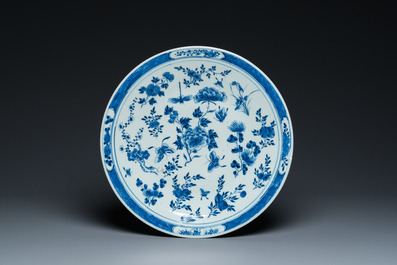 A Chinese blue and white dish and ten plates, 19th C.