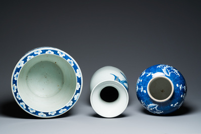 A Chinese blue and white 'landscape' vase, a covered vase and a jardini&egrave;re, 19th C.
