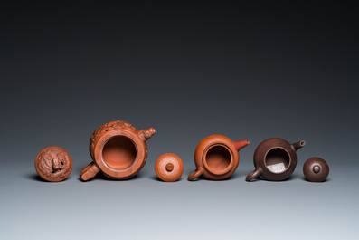 Three Chinese Yixing stoneware teapots with covers and a pair of famille rose pheasants, 19/20th C.