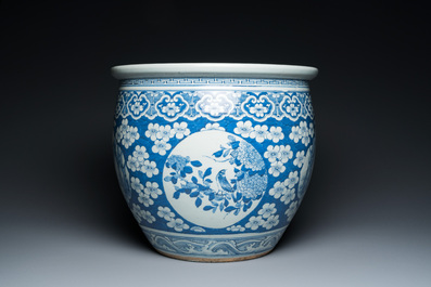 A Chinese blue and white fish bowl with medallions on a prunus-ground, 19th C.