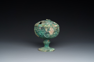 A Chinese bronze 'xianglu' censer with reticulated cover, Western Han