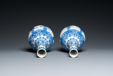 A pair of Chinese blue and white bottle vases, 19th C.