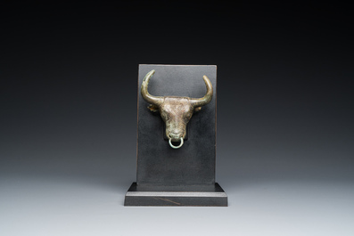 A Chinese bronze buffalo head ornament, Warring States Period