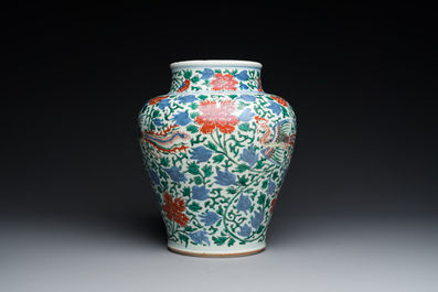 A Chinese wucai 'phoenix and peony scrolls' vase, Transitional period