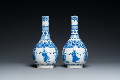 A pair of Chinese blue and white bottle vases, 19th C.