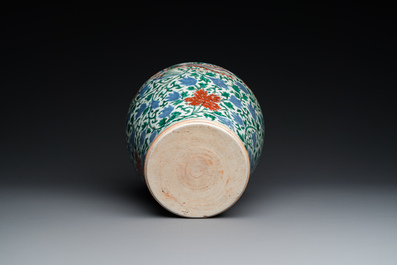 A Chinese wucai 'phoenix and peony scrolls' vase, Transitional period