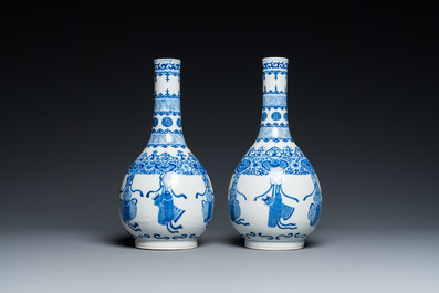 A pair of Chinese blue and white bottle vases, 19th C.