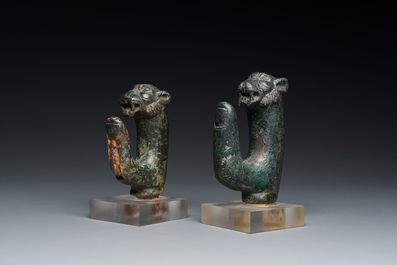 A pair of Roman bronze panther head fittings with finger-shaped hooks, ca. 2nd C.