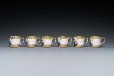 A French porcelain 14-piece tea service with cherubs, Paris, marked for the Nast workshop, 19th C.
