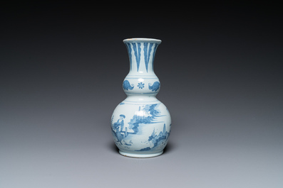 Two Dutch Delft blue and white chinoiserie vases and a deep salad bowl, 17/18th C.