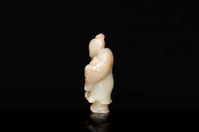 A Chinese jade sculpture of a boy, 18/19th C.