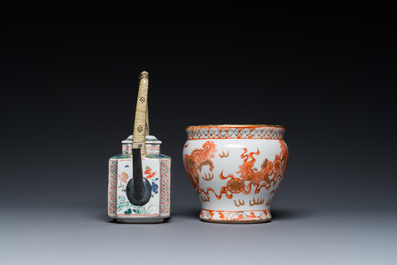 A Chinese famille verte 'Buddhist lions' teapot and a Thai market spittoon, Kangxi and later