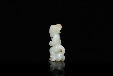 A Chinese celadon jade sculpture of a boy with a cat, Qing