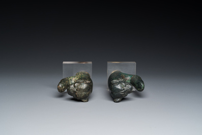 A pair of Roman bronze panther head fittings with finger-shaped hooks, ca. 2nd C.