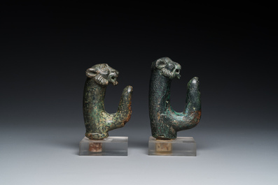 A pair of Roman bronze panther head fittings with finger-shaped hooks, ca. 2nd C.